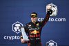 MIAMI, FLORIDA - MAY 08: Race winner Max Verstappen of the Netherlands and Oracle Red Bull Racing celebrates on the podium during the F1 Grand Prix of Miami at the Miami International Autodrome on May 08, 2022 in Miami, Florida. (Photo by Chris Graythen/Getty Images) // Getty Images / Red Bull Content Pool // SI202205090002 // Usage for editorial use only //
